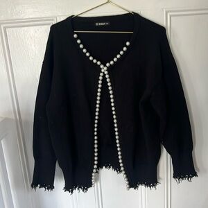 Black cardigan trimmed with large pearls size XL simply gorgeous! Fits like lrg